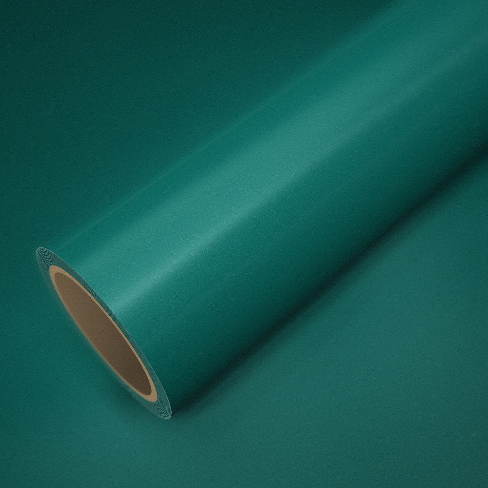 Rouleau de vinyle ICR® vert Aston posé sur une feuille du même vinyle