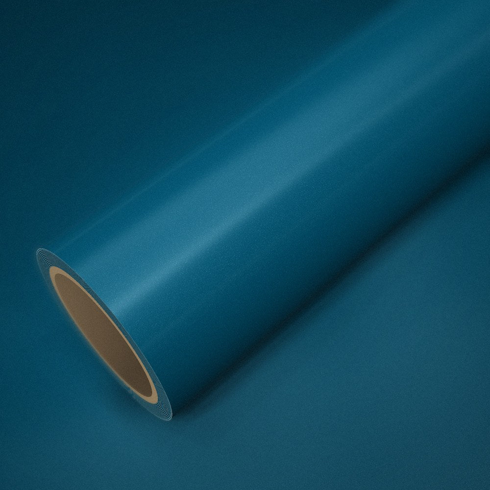 Rouleau de vinyle ICR® vert paon posé sur une feuille du même vinyle