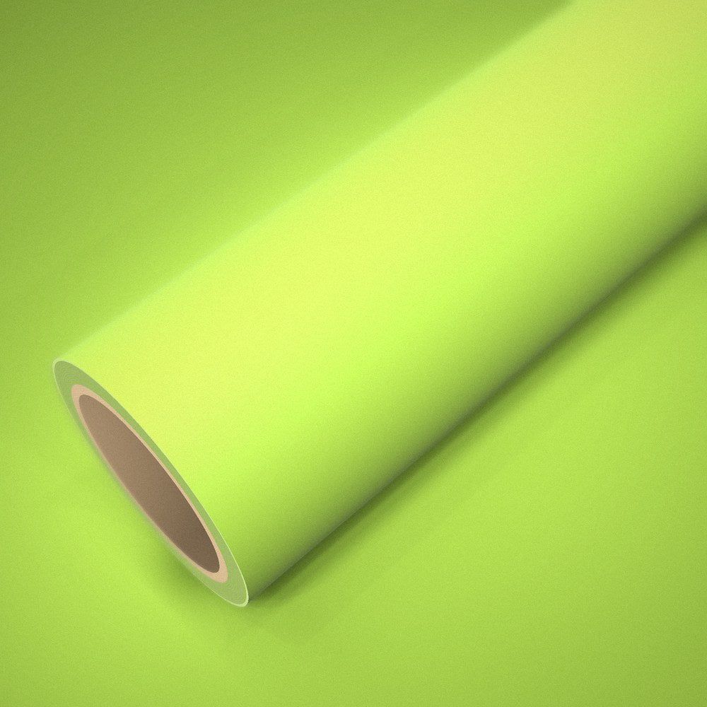 Rouleau de vinyle ICR® jaune fluo mat posé sur une feuille du même vinyle