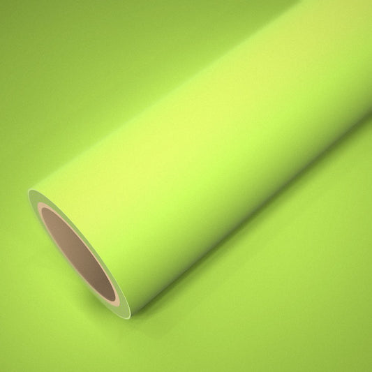 Rouleau de vinyle ICR® jaune fluo mat posé sur une feuille du même vinyle
