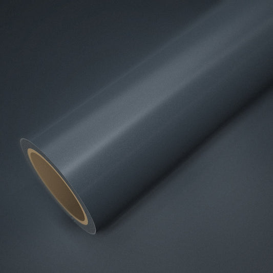 Rouleau de vinyle ICR® noir pailleté posé sur une feuille du même vinyle