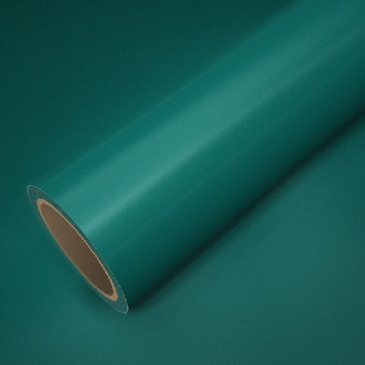Rouleau de vinyle ICR® vert Aston posé sur une feuille du même vinyle