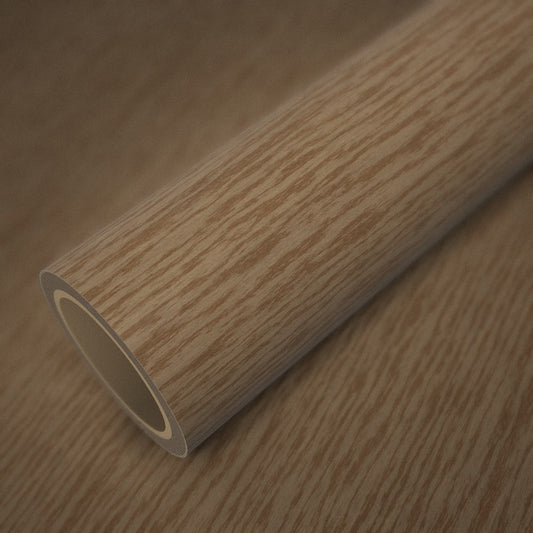 Rouleau de vinyle bois de hêtre posé sur une feuille du même vinyle